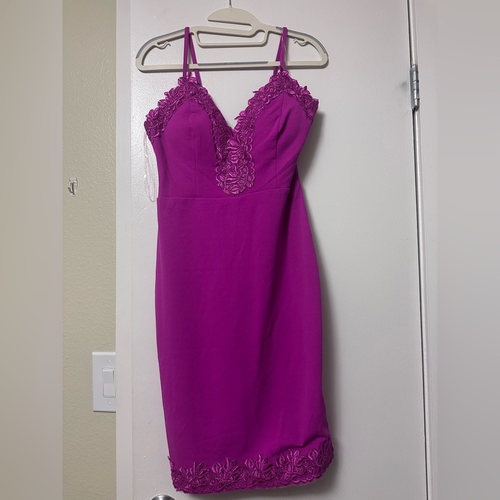Fuschia dress with floral detailing